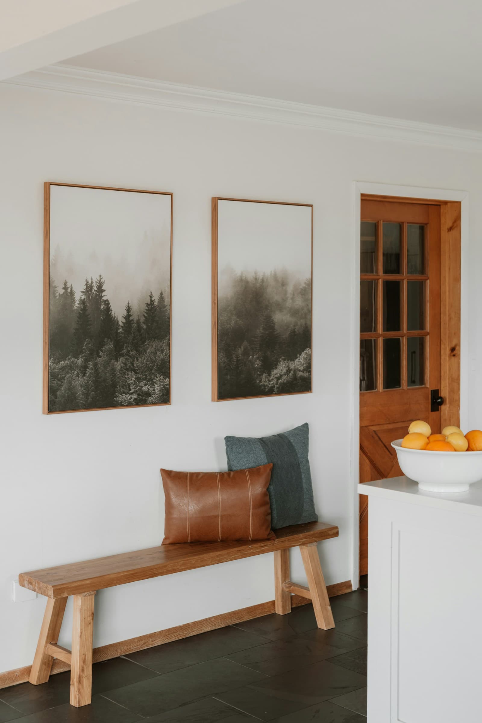 Wood bench and storage in a bright home